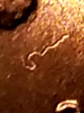 2017-P-Lincoln-Cent-Struck-Through-String-Near-Lincoln's-Chin-On-Obverse?